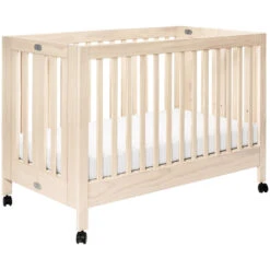 Babyletto Maki Full-Size Folding Crib With Toddler Bed Conversion Kit -Baby Go Round Store M6601NX White Background Main 00 e9cccf96 8e32 4612 b4c7 4fe86a2cea97