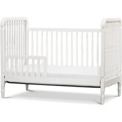 Namesake Liberty 3-in-1 Convertible Spindle Crib With Toddler Bed Conversion Kit -Baby Go Round Store M7101RW White Background 03 d284b9a2 3eb9 4e95 9016 6bbde5f33c80