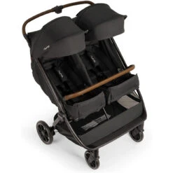 Nuna TRVL DUBL Stroller -Baby Go Round Store Nuna TRVLdubl Caviar BassinetMode Angle US 8x8 ef2757e7 b0e0 4543 8c58 36f02aa4c7fc