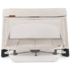 UPPAbaby Remi Bedside Bassinet + Playard + Travel Crib -Baby Go Round Store REMI22 CHR Front PanelOpen 4667x3718 f47703d