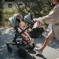 Mushie Silicone Pacifier Holder Case (Blush) 5 Mushie Silicone Pacifier Holder Case (Blush) -Baby Go Round Store moms3 93of171 600x e56117f6 b54f 437d be8a c027e3b28380