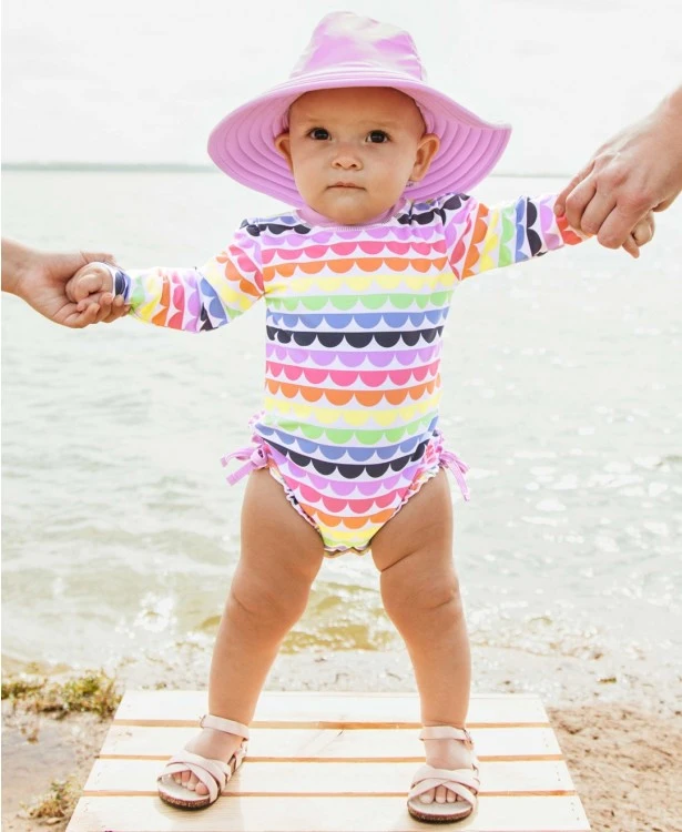 RuffleButts Rainbow Scallop One Piece Rash Guard 4 RuffleButts Rainbow Scallop One Piece Rash Guard - Image 4