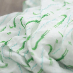 Saranoni Muslin Swaddles -Baby Go Round Store saranoni grazing gators swaddle